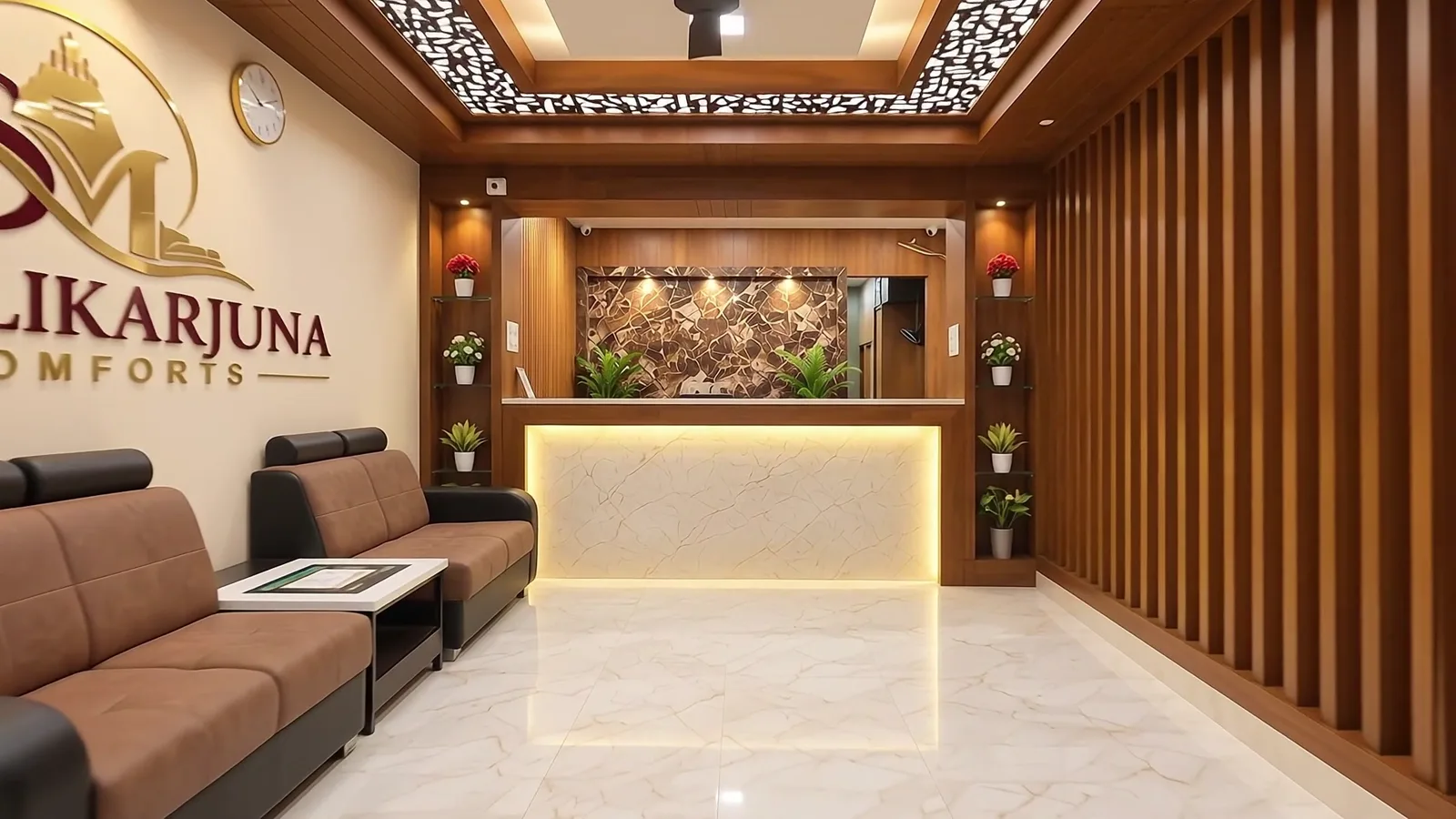 Lobby lounge with brown leather sofas and a jaali-patterned ceiling